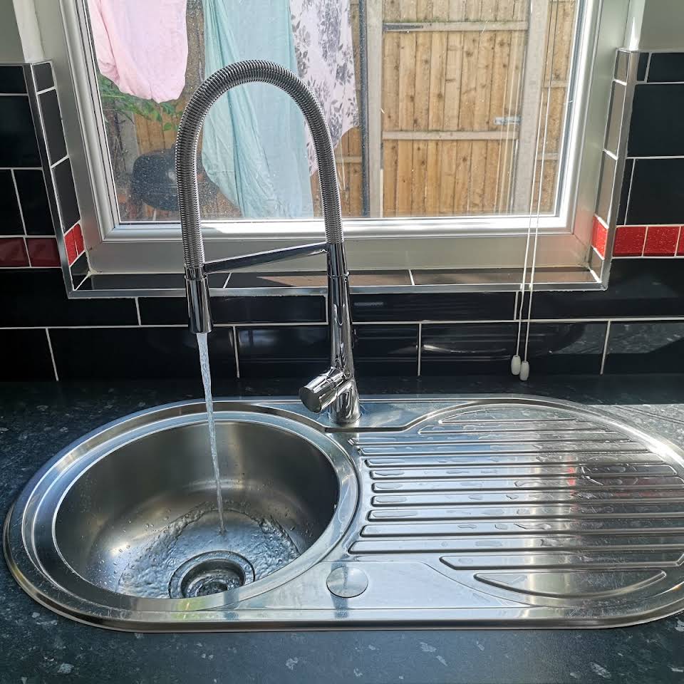 kitchen tap running